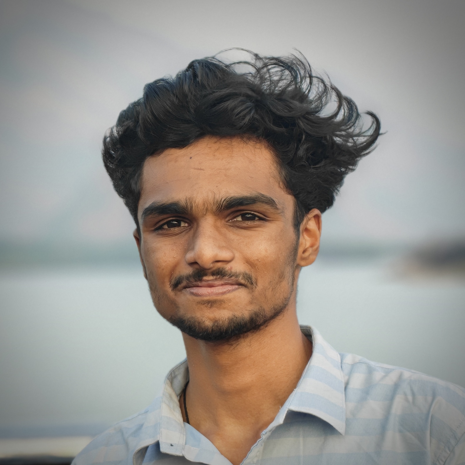 Aravind R